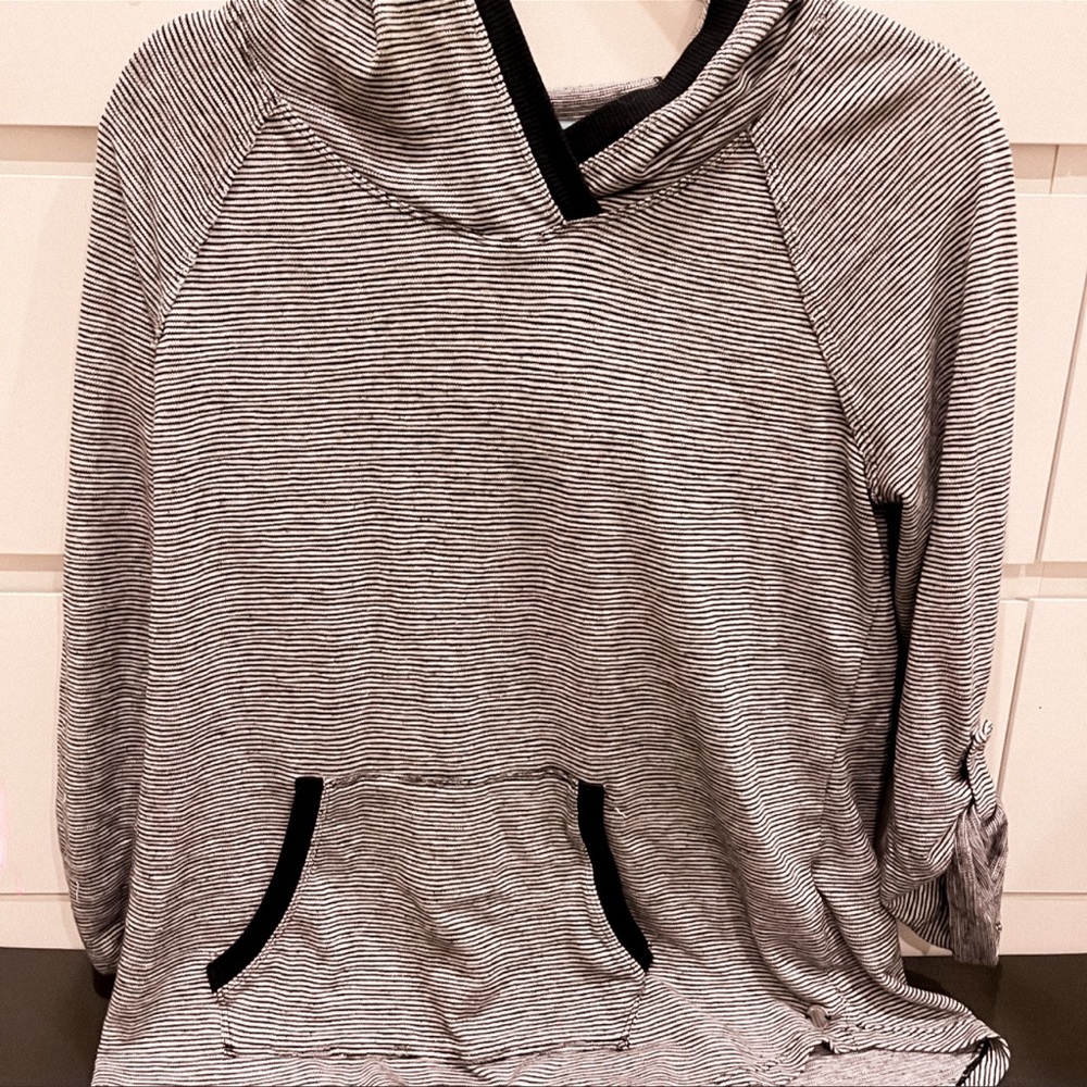 Calvin Klein size L black and white stripped sweater